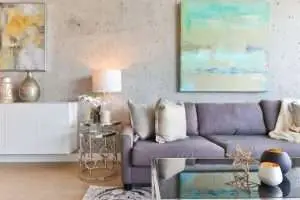 a room with a gray sofa.