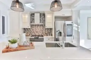 a kitchen with marble countertops.