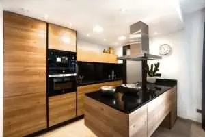 a kitchen with wooden floors.