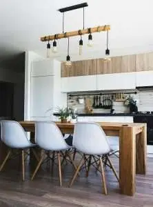 a kitchen with a wooden table.