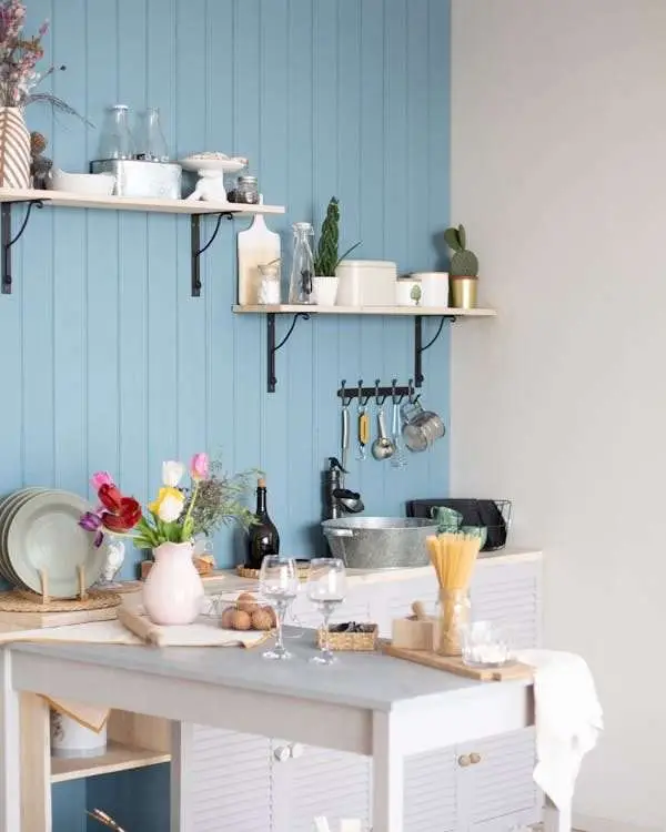 a kitchen space with blue accents.